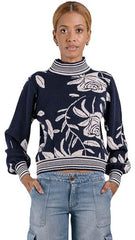 Buzo cuello alto jacquard